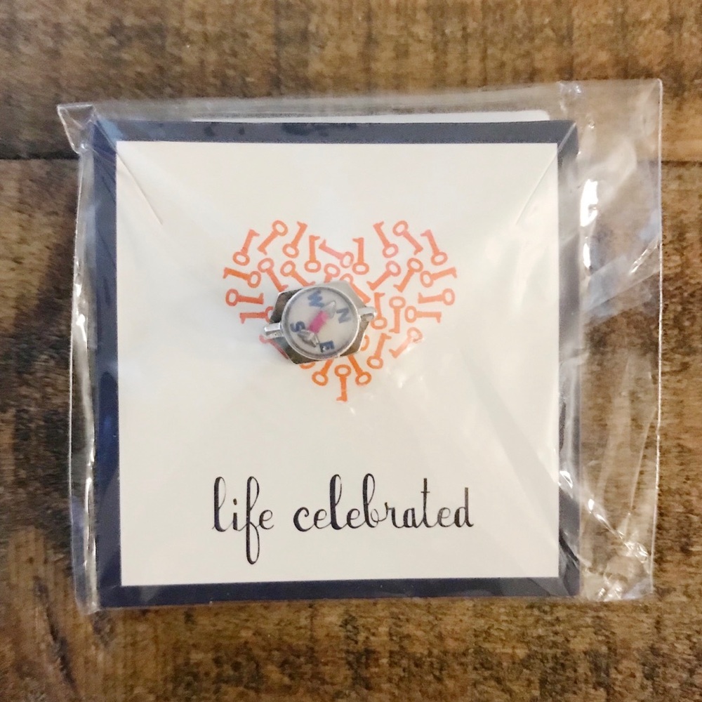 Keep Collective compass charm